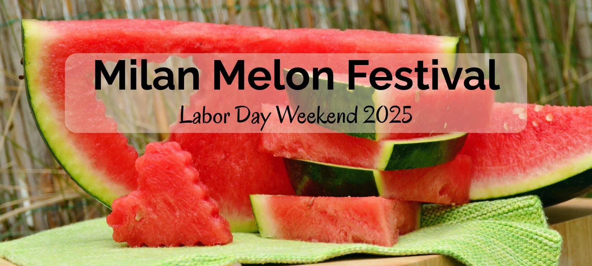 Watermelon cut open on a table with a heart -shaped piece. Text reading MIlan Melon Festival Labor Day Weekend 2025